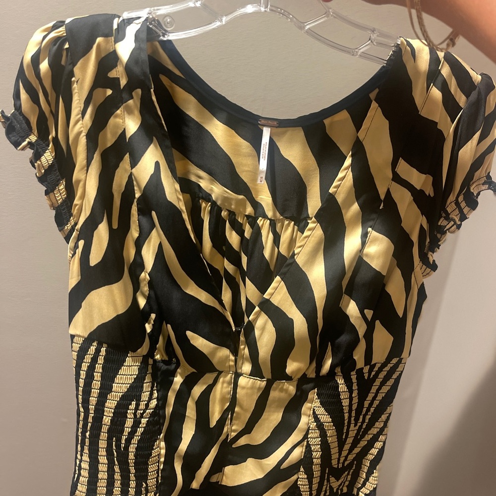 Free people Zebra Print Black and Gold Blouse